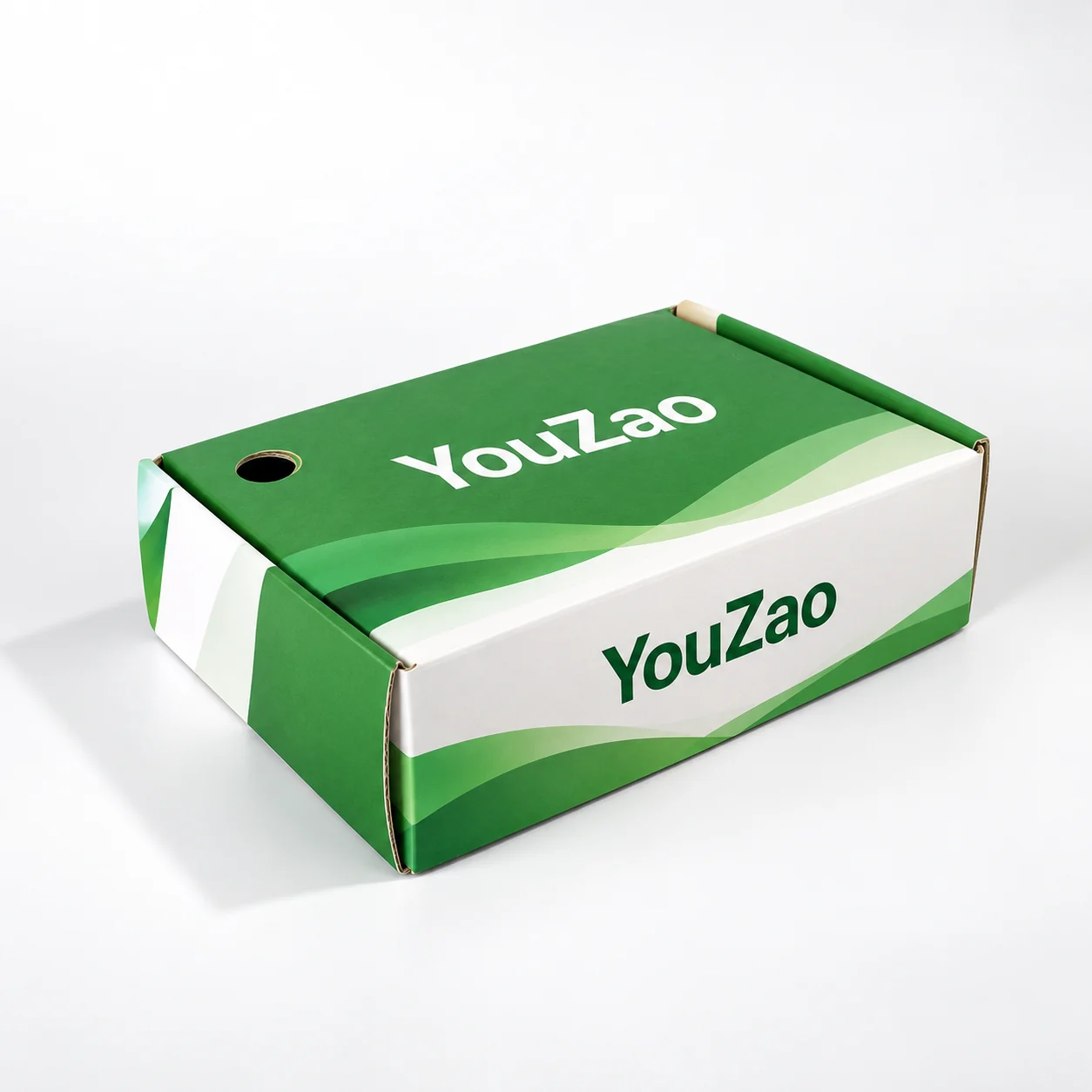 Closed green and white corrugated folding mailer gift box with printed logo