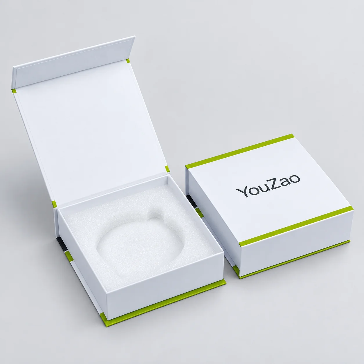 Front view of an open white magnetic box with a circular recess insert
