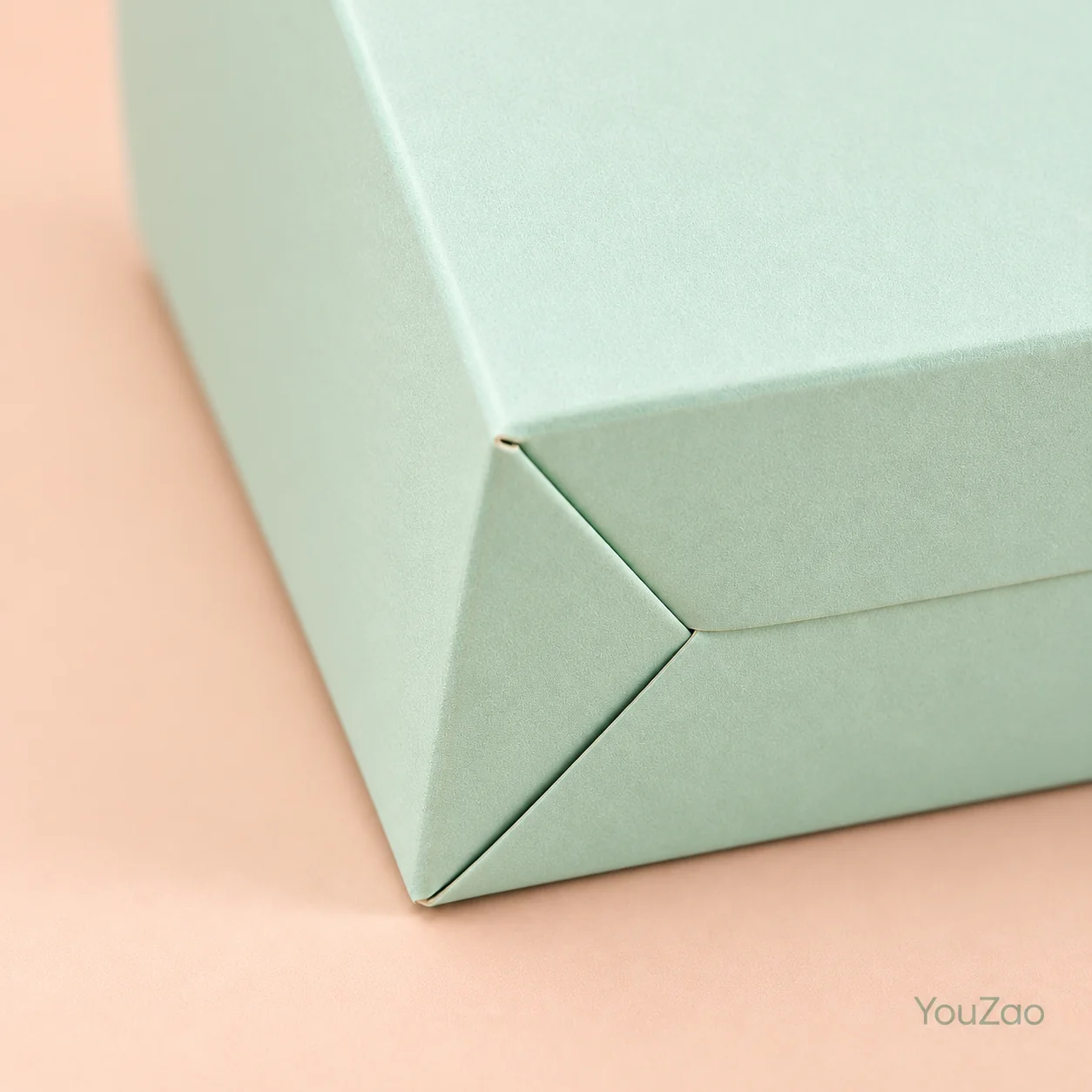 Close-up of a mint paperboard box folded corner and panel joint