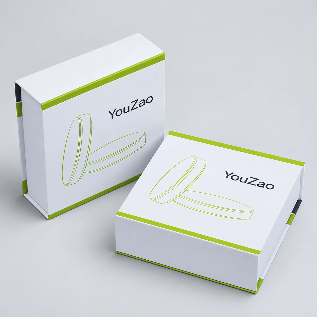 White and green magnetic boxes shown upright and lying flat